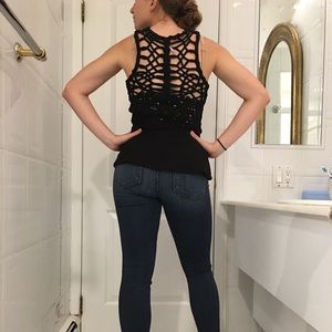 Black peplum top with back design